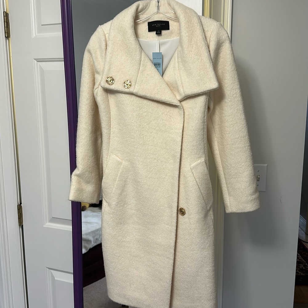 Never worn brand new coat size xs petite